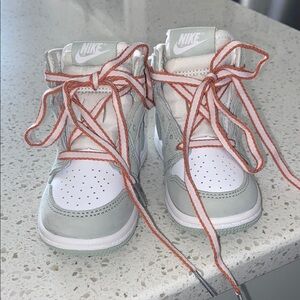 Nike High-Top Sneakers with Orange Laces